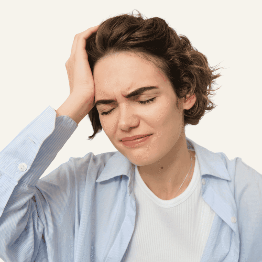 up close shot of woman suffering from head discomfort