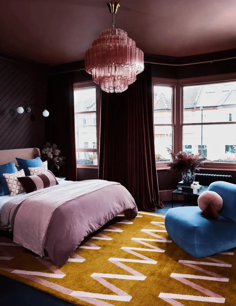 Mauve and mustard dark bedroom