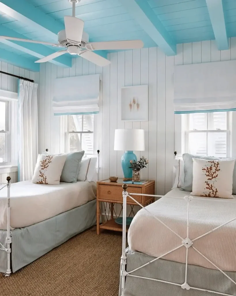 beachy bedroom with a blue ceiling