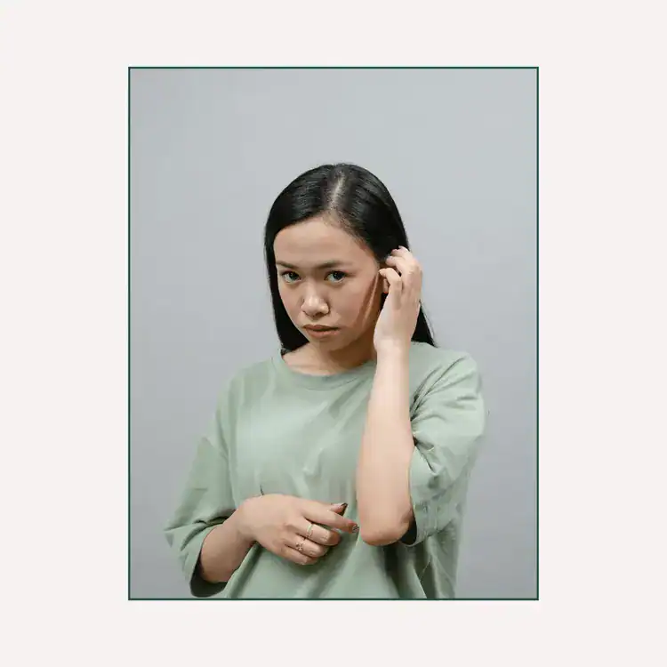A-Shy-Woman-in-Green-Shirt