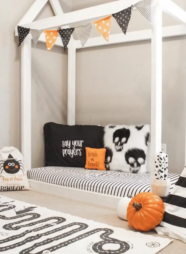 Hang halloween bunting. kids halloween bedroom ideas