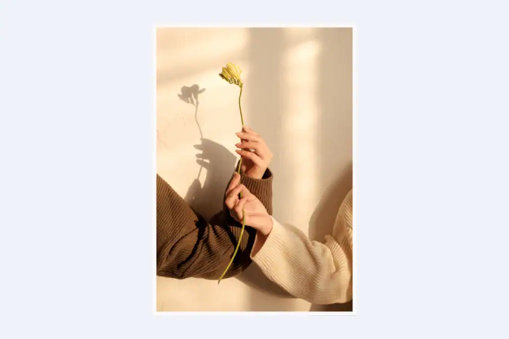 Self-Empowerment-Affirmations.-two-friends-holding-a-flower