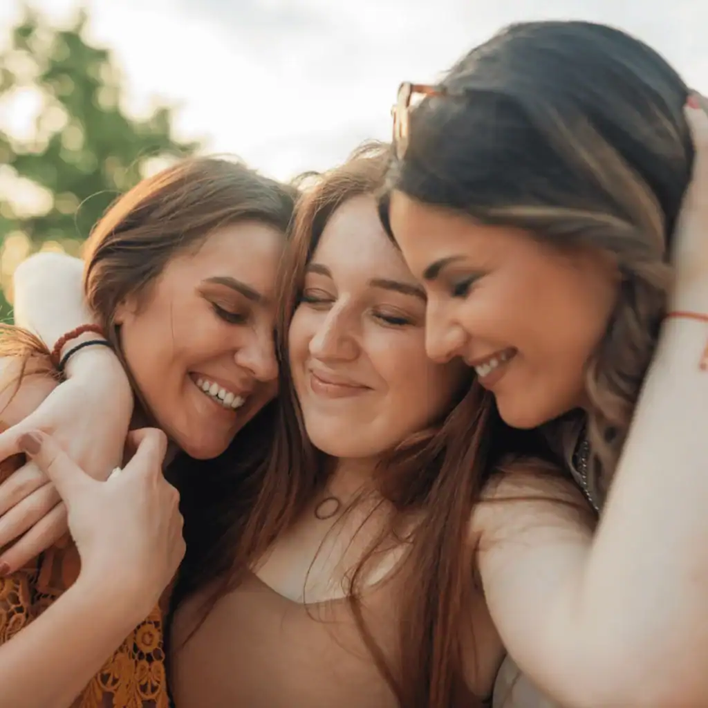 Three-female-friends-hugging