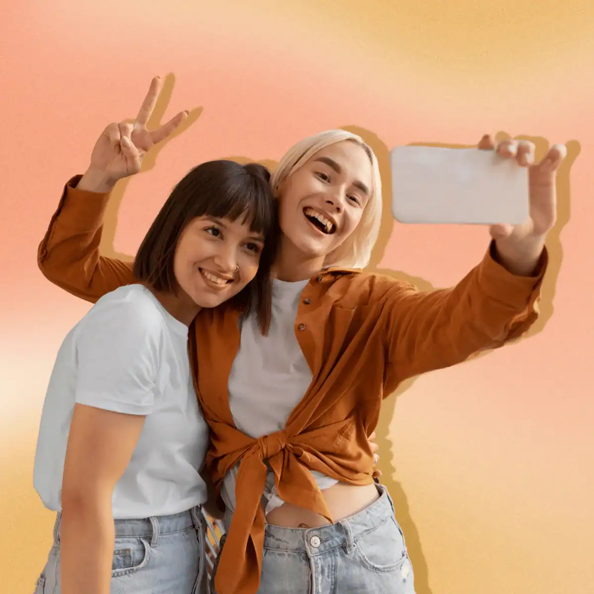 Two-friends-posing-for-selfie.-Background-is-an-orange-and-peach-gradient