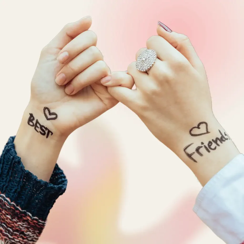 Two-hands-attached-by-the-smallest-finger-with-the-sign-best-friends-on-both-wrists
