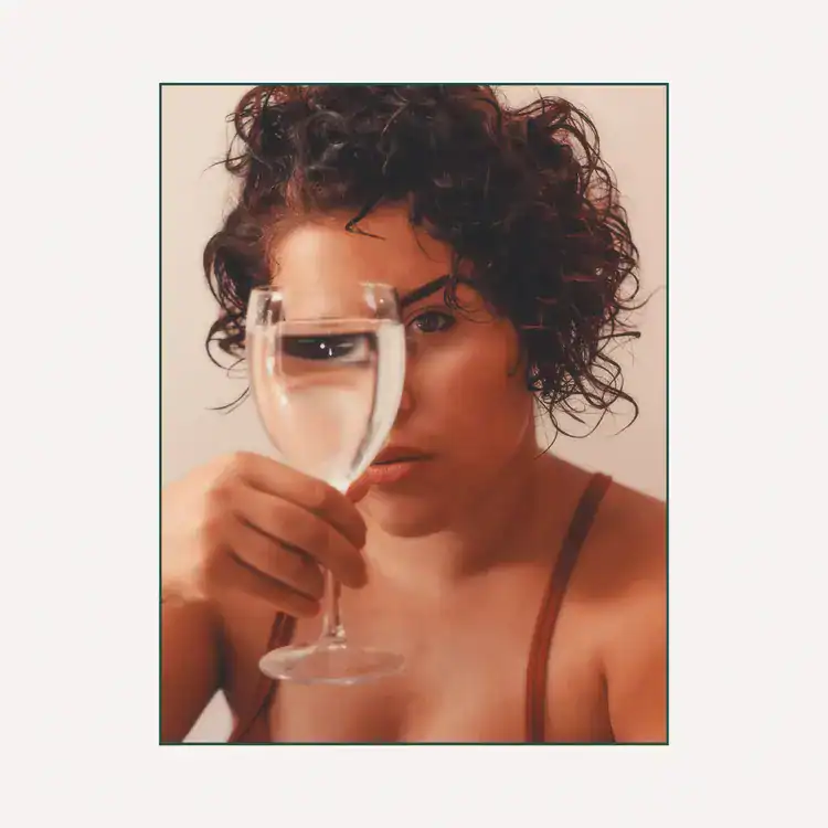 Woman-Holding-Glass-of-Water