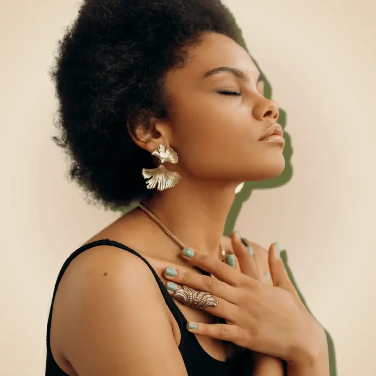 Woman-in-Black-Spaghetti-Strap-Top-Meditating.-Signs-of-blocked-feminine-energy