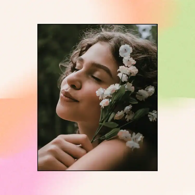 Woman-with-flowers-near-her-face-closed-eyes-in-nature.-Powerful-Gratitude-Affirmations-for-Happiness-and-Peace