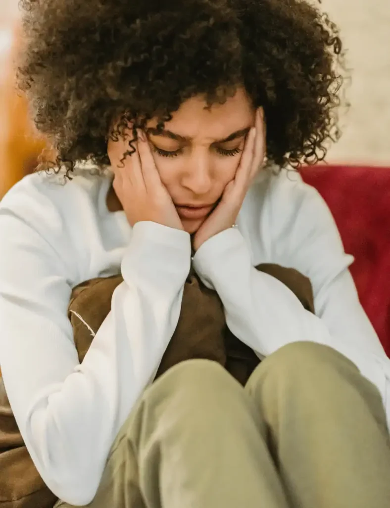 anxious-woman-holding-her-head
