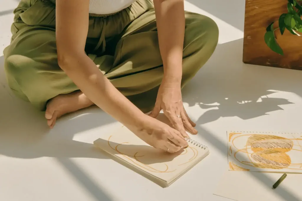 woman-doing-artwork-in-an-artbook