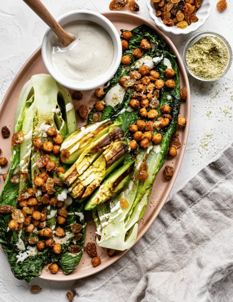 Grilled Romaine Salad with Tandoori Chickpeas and Golden Raisins