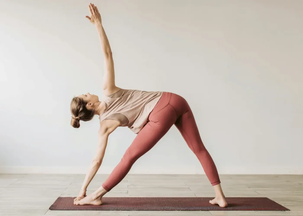 A Woman Doing Yoga. How to create a fall morning routine