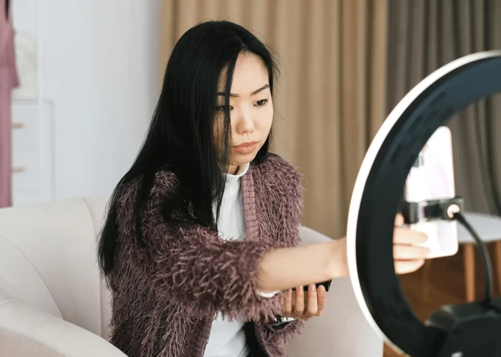 Woman Filming Vlog on Smartphone Camera. Positive Affirmations For Entrepreneurs