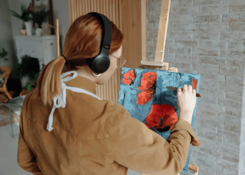 Woman cleaning a Painting Tool. Hobbies For Introverts