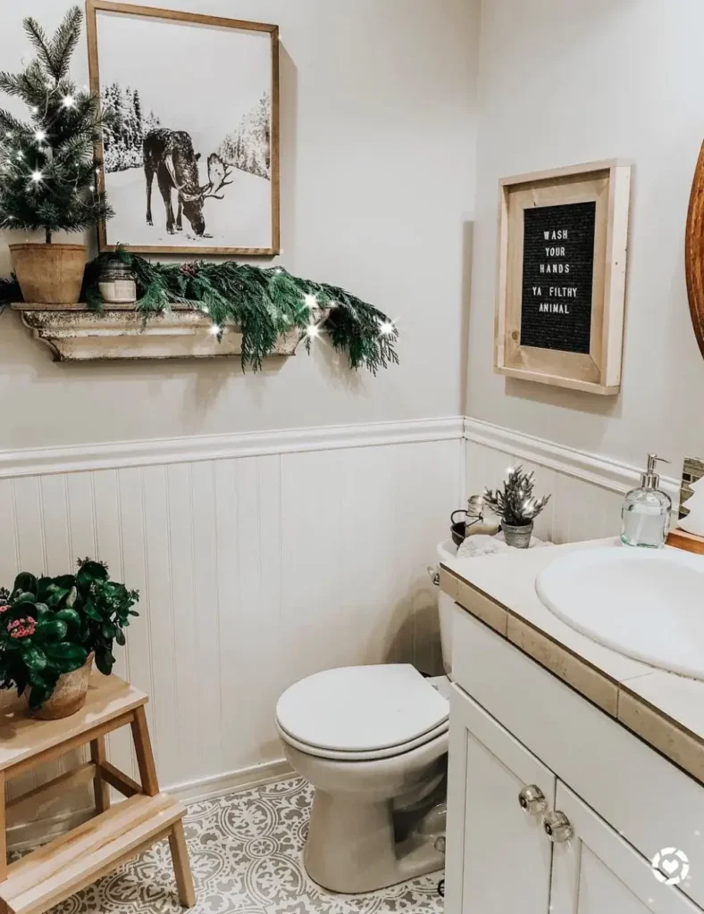 Rustic Woodland Shelf With Sparkling Garland. Christmas bathroom decor ideas