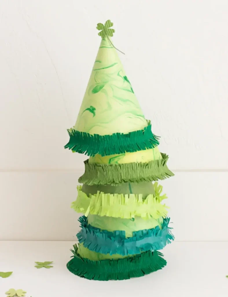 DIY St. Patrick’s Day marbled shamrock party hats. St. Patrick's Day Crafts