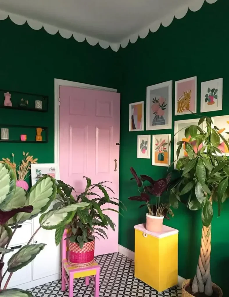 dopamine bathroom look with dark green walls and colorful wall art prints