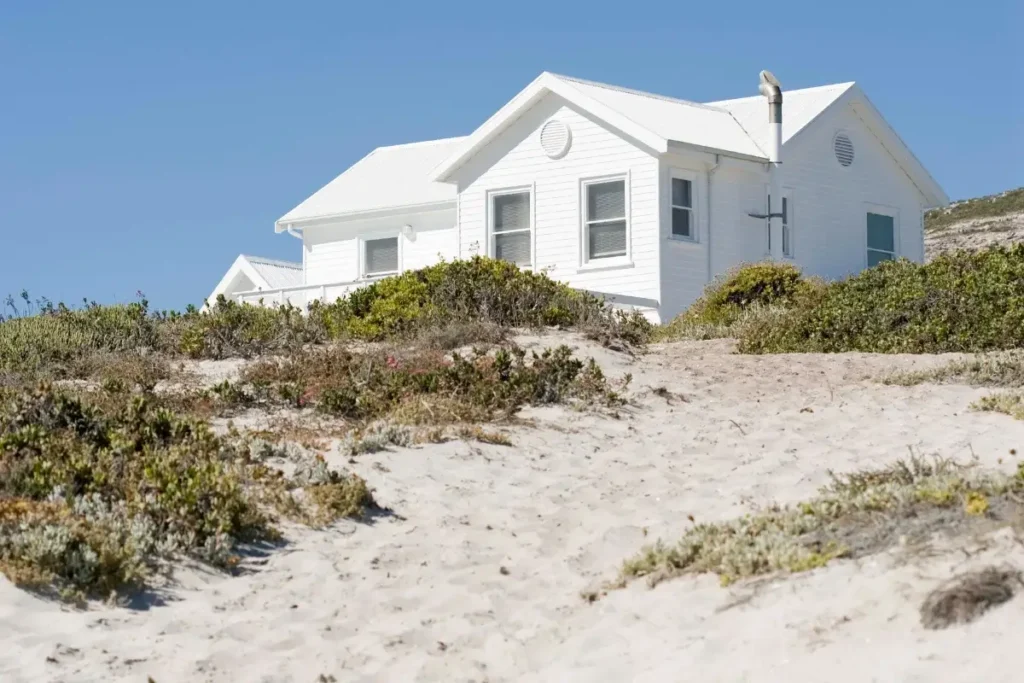 white House on a beach. beach house names