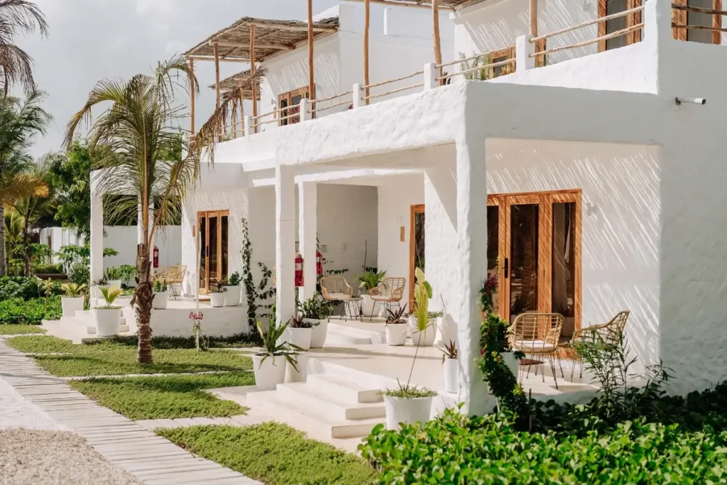 Bright modern villa in Jambiani, Tanzania with lush garden surroundings