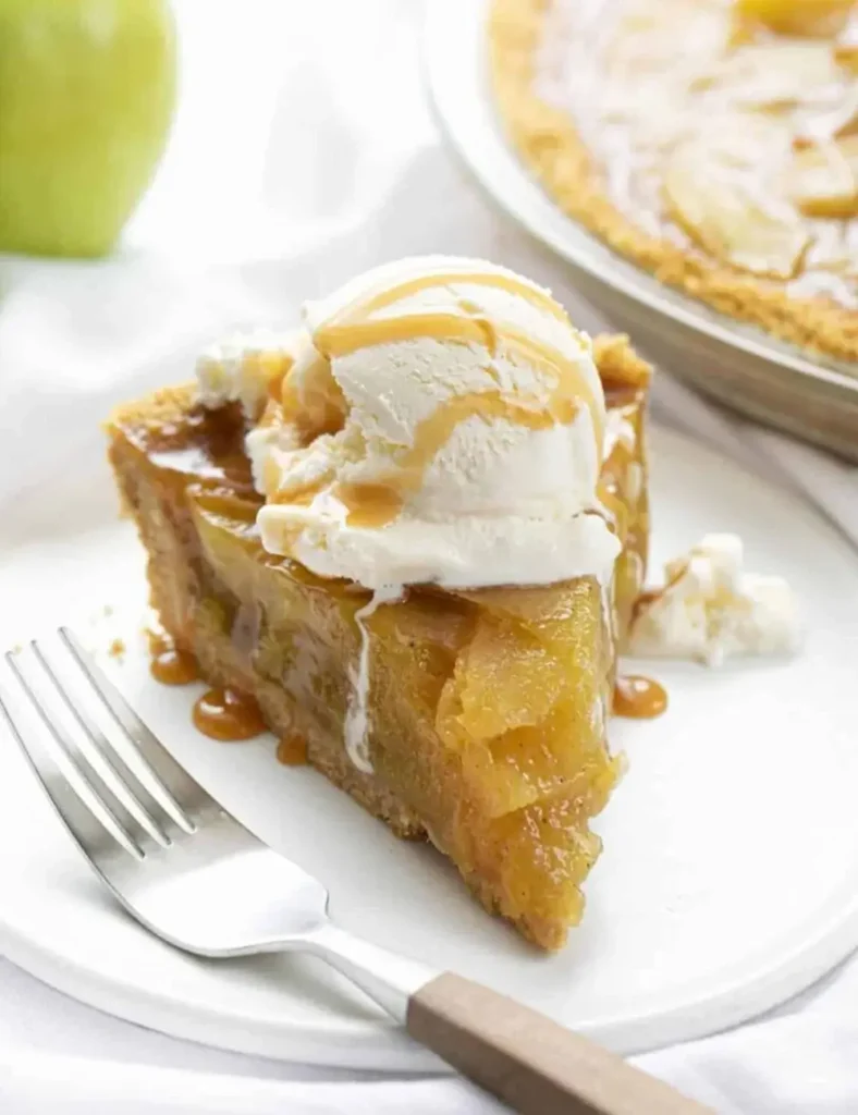No-bake apple pie in a graham cracker crust topped with whipped cream