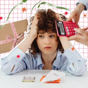 Stressed woman with cash, receipts, a calculator, and a Christmas gift illustrating holiday budgeting