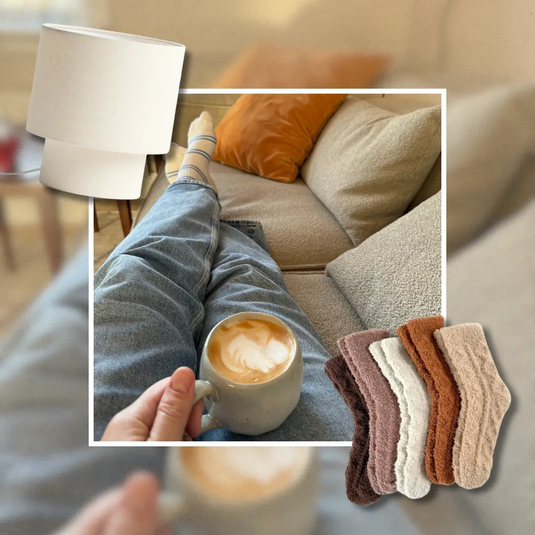 Person relaxing on a cozy sofa in striped socks holding a latte, with a drum lamp and fuzzy socks, illustrating hygge